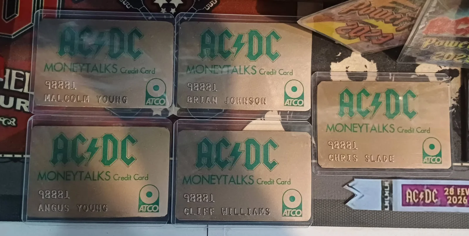 AC/DC Moneytalks promotional credit card set featuring Angus Young, Malcolm Young, Brian Johnson, Cliff Williams and Chris Slade